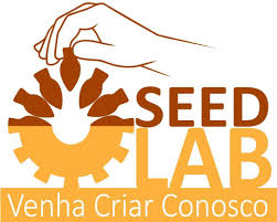 logomarca do SeedLab apresenta uma engrenagem com partes no formato de pinhões euma mão sobre. Abaixo, lemos 